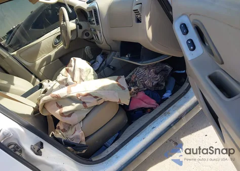 2005 Ford Escape Xlt z USA, uszkodzony, nr VIN 1FMYU931X5KB34165